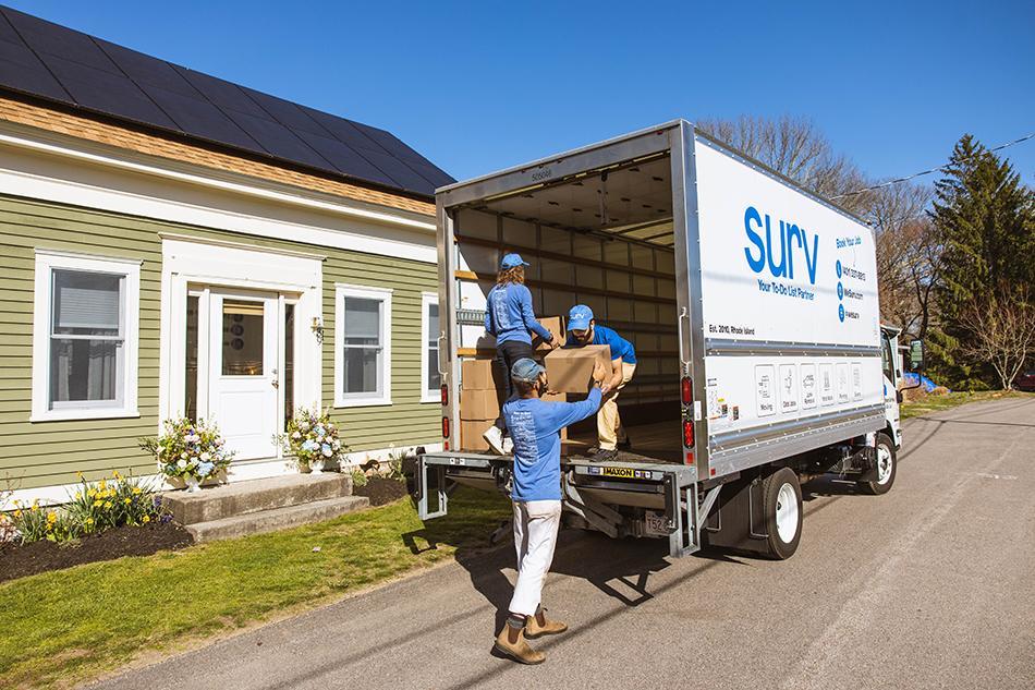 people and a moving truck