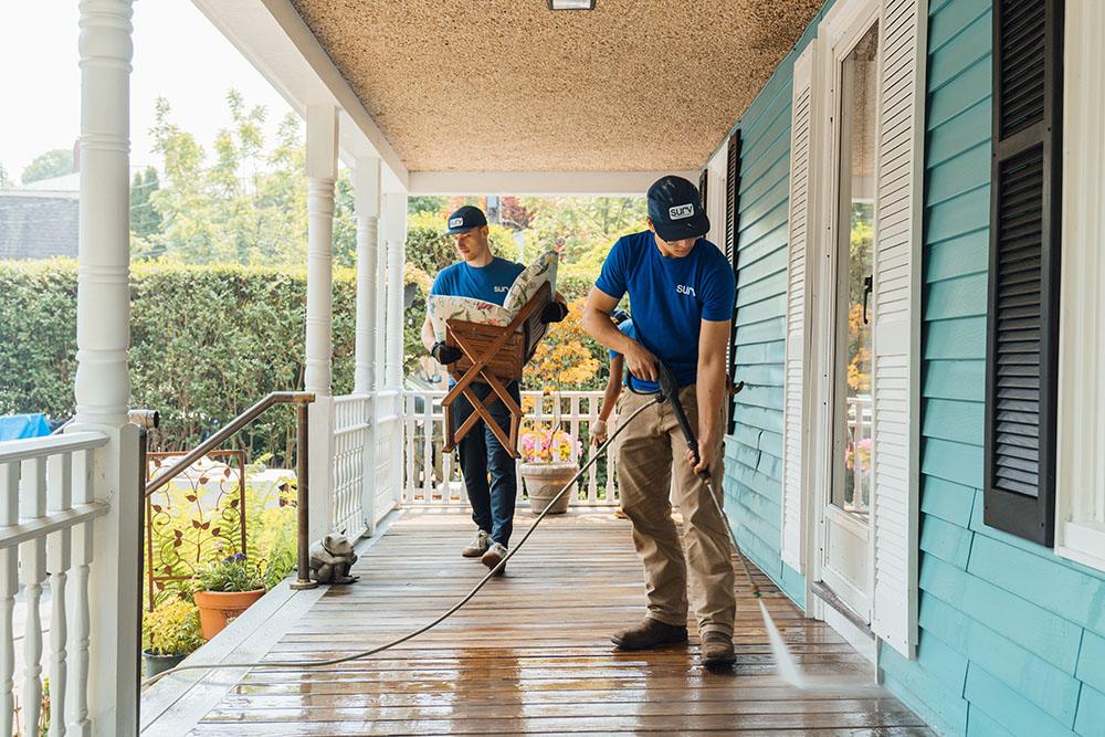 Surv Workers cleaning a patio
