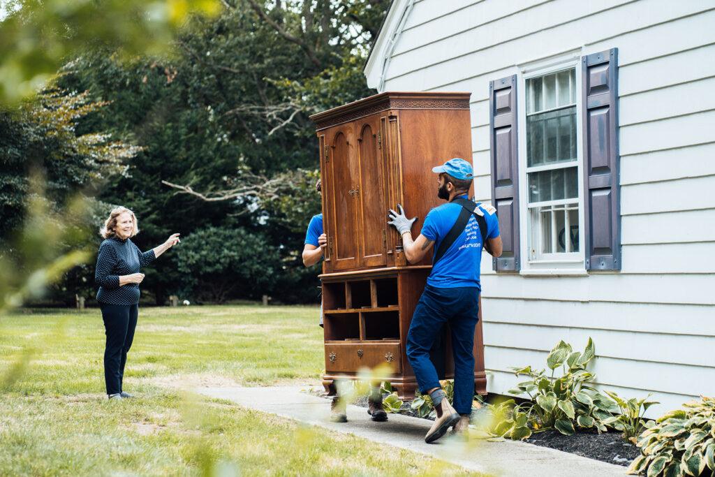 Surv workers moving furniture