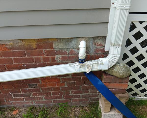 Downspout Repair before