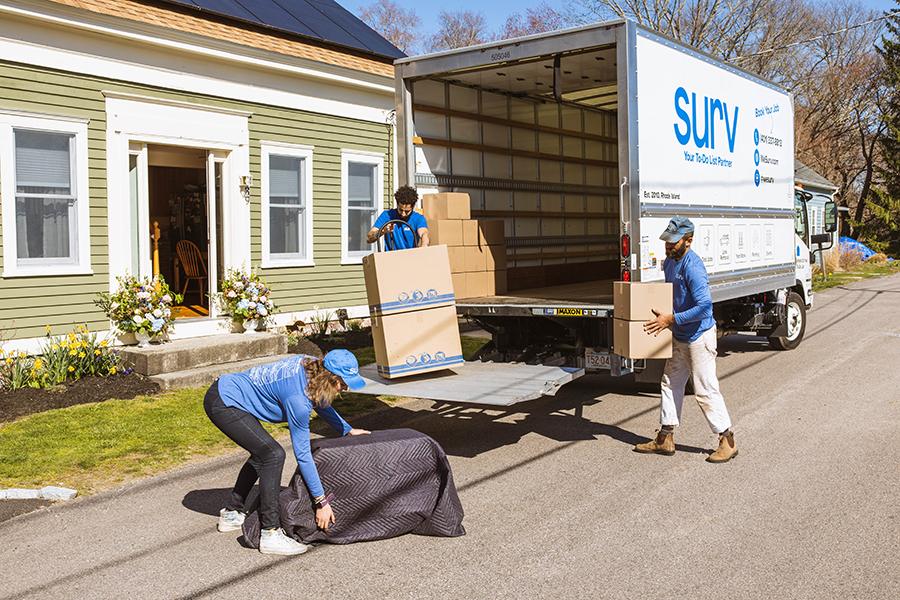 Surv team unloading a truck
