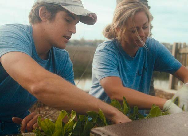 Two Surv employees working outdoors