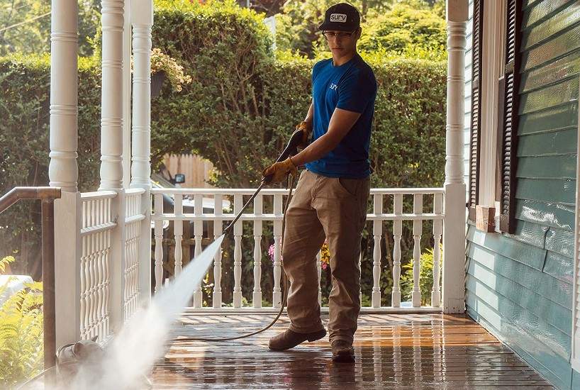 Power washing a front porch
