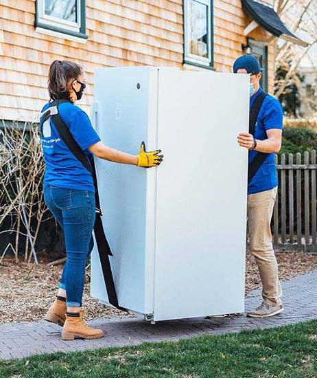 Hauling away an old refridgerator