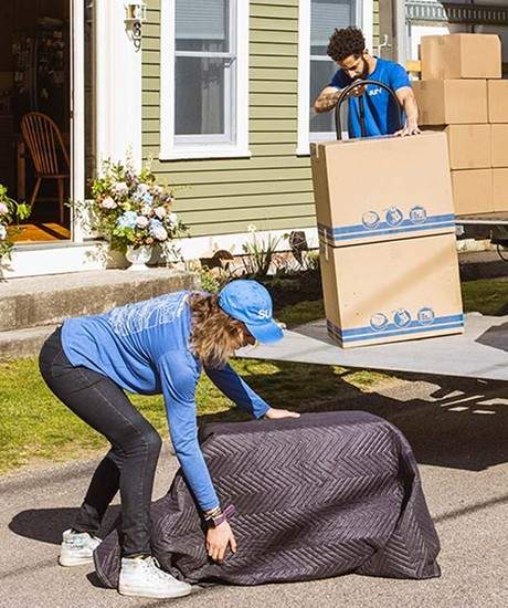 Hauling an item wrapped in a moving blanket